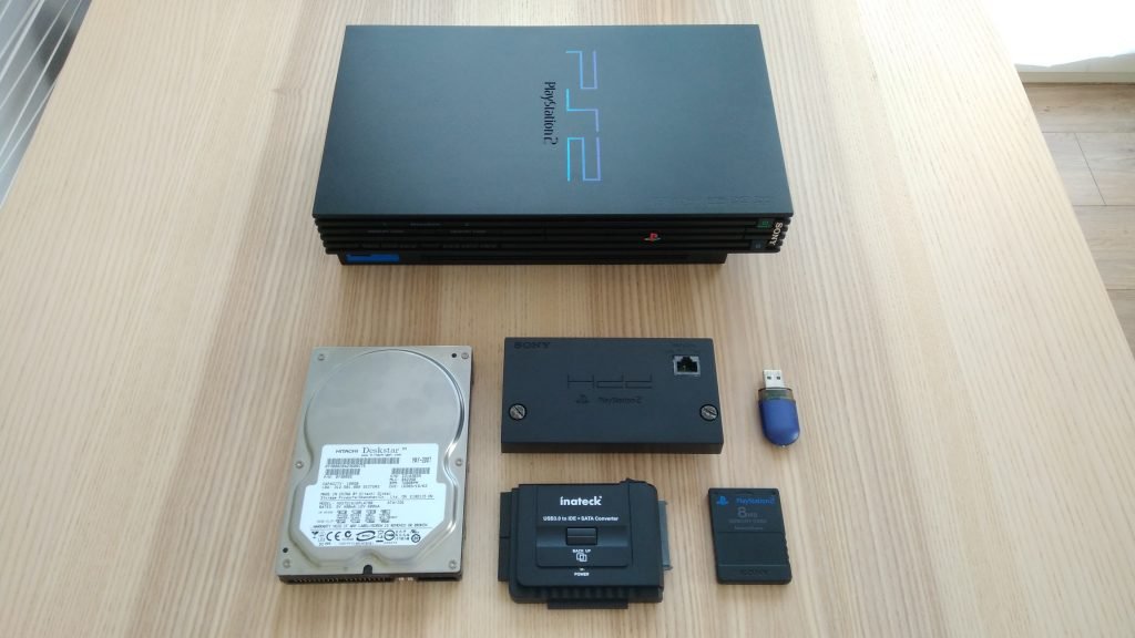 A PS2 + a hard disk + a network adapter + an IDE/SATA to USB adapter + a USB key + a memory card: We're good to go!